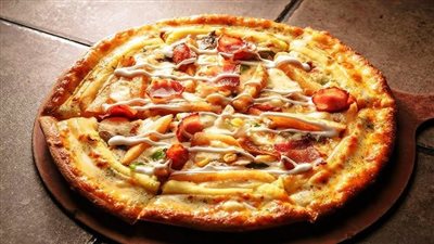 طريقة عمل بيتزا البطاطس، لذيذة ومشبعة وسريعة التحضير 