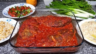 طريقة عمل صينية السمك بالصلصة فى الفرن 