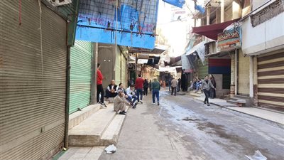 محلات السوق التجاري بالمنصورة تغلق أبوابها حزنا علي ضحايا حريق مول الخواجات 