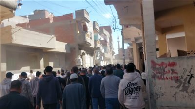 جنازة مهيبة لأب ونجله ضحايا حريق مول سوق الخواجات بالمنصورة (صور)