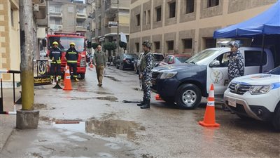 انتخابات النواب، أجواء ممطرة وتأمين مكثف بمحيط لجنة مدرسة الملك الكامل بالمنصورة (فيديو وصور)