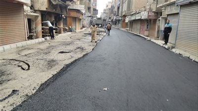 رصف عدد من الطرق في الجيزة |صور
