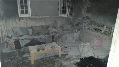 ماس كهربائي وراء تفحم محتويات شقة سكنية بأوسيم (صور)