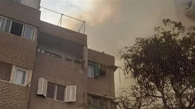 المعمل الجنائي يفحص آثار حريق شقة سكنية في الدقي (صور)