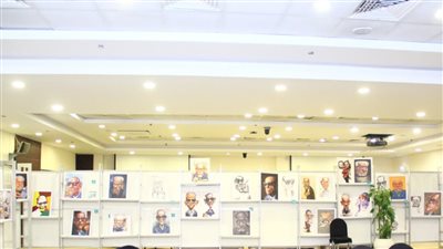 ما بين العمق والسخرية الذكية، شاهد كيف احتفى الكاريكاتير العالمي بـ نجيب محفوظ في معرض الكتاب