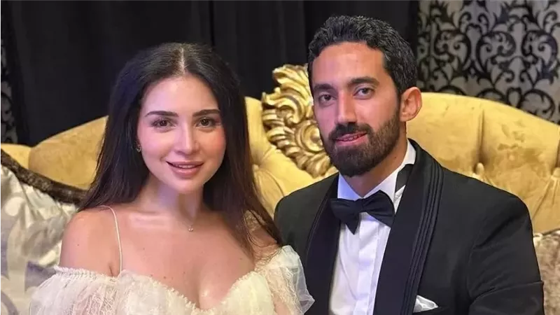 مي عز الدين وزوجها