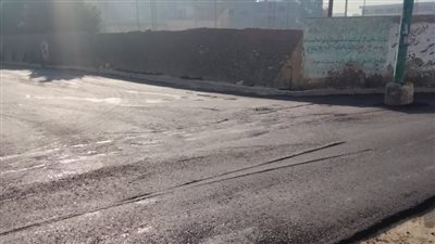 لحظة رصف وتطوير الشوارع في العمرانية ومنشاة القناطر|صور وفيديو