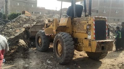 رفع المخلفات من أمام كورنيش النيل بأوسيم | صور