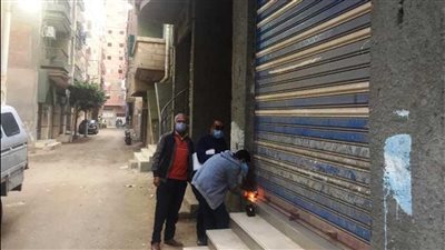 غلق وتشميع 23 محلا تجاريا بحي الوراق