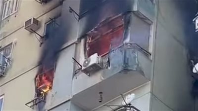 المعمل الجنائي يعاين موقع حريق شقة بالعمرانية (صور) 