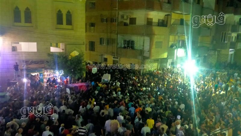 جنازة ربة منزل وطفلها
