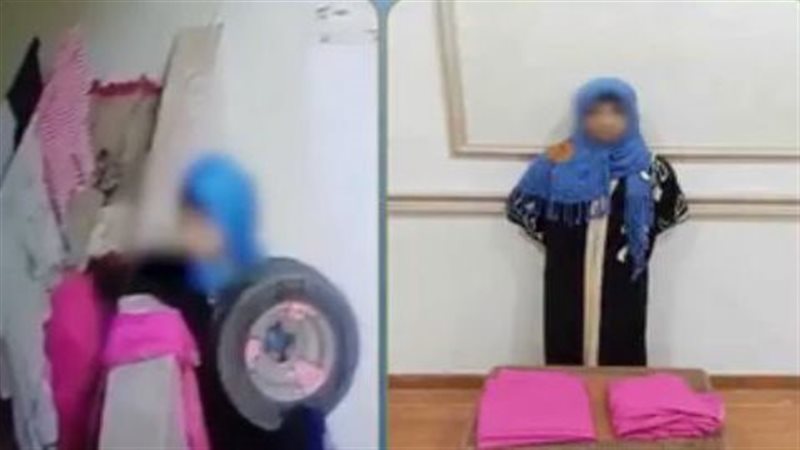 سيدة تسرق ملابس من
