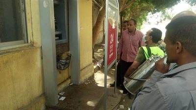 فرق لتعقيم وتطهير ماكينات الصراف الآلي بقنا | صور