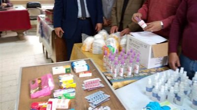 ضبط كمامات ومطهرات مجهولة المصدر في الإسكندرية | صور