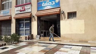 شن حملات لتعقيم الأماكن العامة للوقاية من كورونا بحدائق أكتوبر | صور