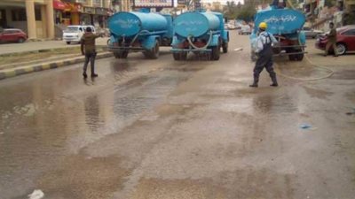 جهاز مدينة العبور يطهر شوارع المدينة ضد كورونا | صور