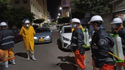 ناقلات التطهير تعقم مسكن وعيادة أول شهداء الجيش الأبيض طبيب تحاليل بورسعيد.. صور
