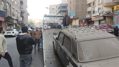 لحظة رفع السيارات المتهالكة والمتروكة بشوارع الجيزة | فيديو وصور 