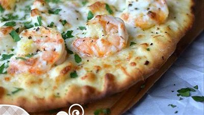 طريقة عمل البيتزا في المنزل خطوة بخطوة والنتيجة مضمونة