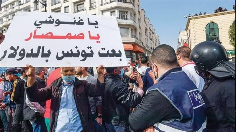  لافتة مناهضة للغنوشي