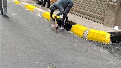 تركيب تغطية بالوعات الأمطار في شمالي الجيزة | صور