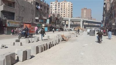 استكمال أعمال تطوير شارع عثمان محرم في العمرانية | صور