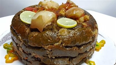  طريقة عمل طاجن ورق عنب بالكوارع|فيديو