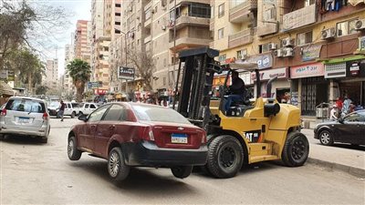 توقف تراخيص السيارات المخالفة لقرار حظر الانتظار والمبيت بالجزيرة الوسطى | صور