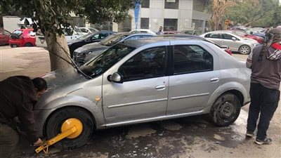 ضبط 11 سيارة مخالفة في حملة بشارعي التحرير وسليمان جوهر بالجيزة | صور
