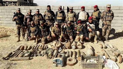 ضبط معدات عسكرية وأحزمة ناسفة وصواريخ لداعش بالعراق