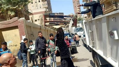 رفع 1200 حالة إشغال للمحال وإزالة التعديات على الطريق العام بالهرم | صور 