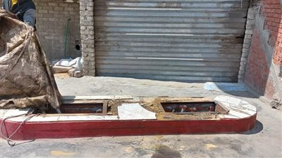 إزالة مخالفة لتحويل النشاط من سكنى إلى تجارى بدون ترخيص بالمنيا