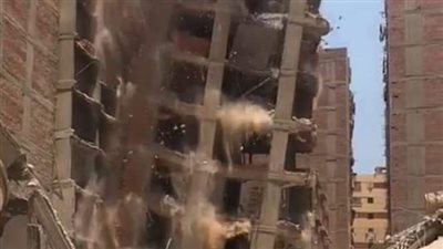 إزالة أعمدة عقارات مخالفة وبدون ترخيص في امبابة | فيديو