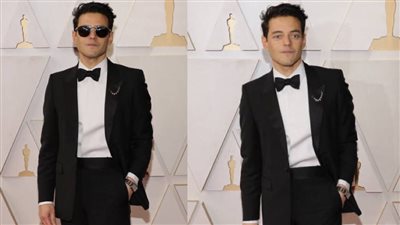 رامي مالك يتألق ببدلة كلاسيكية على السجادة الحمراء للأوسكار 2022