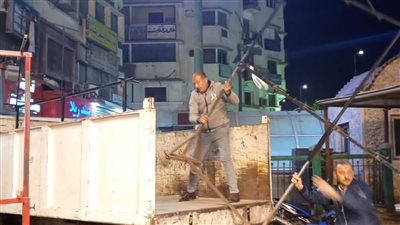 رفع الحواجز من شارع مراد في حملة إشغالات بحي جنوب الجيزة | صور