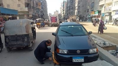 كلبشة 12 سيارة بشوارع الدقي