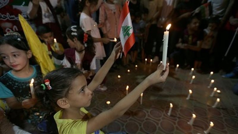 وقفة تضامنية بالشموع
