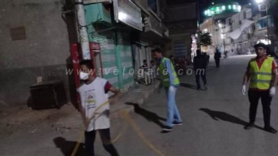 حملات ليلية للتعقيم والتطهير بمناطق ظهور كورونا في قنا | صور