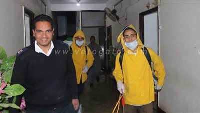 لحظة تطهير وتعقيم قسم شرطة أبو تشت في قنا لمواجهة كورونا | صور