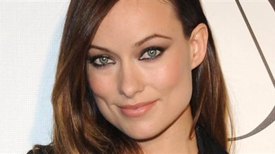 أوليفيا وايلد تكسر الحظر في أمريكا لتتنزه مع كلبها