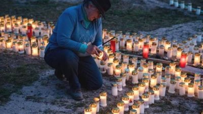 ألمانية تخلد ذكري ضحايا كورونا بالشموع | صور