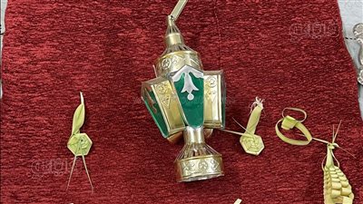 أقباط قنا يحتفلون بأحد الشعانين بالخوص وفانوس رمضان | صور