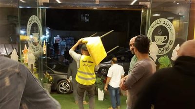 رفع 233 إشغال لتيسير حركة المرور خلال حملة في الدقي| صور