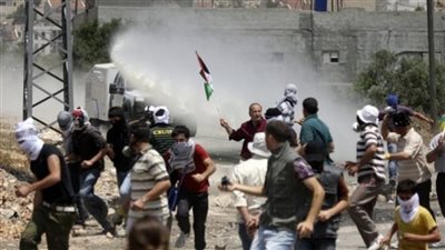 إصابة عشرات الفلسطينيين في مواجهات مع الاحتلال بباحات الأقصى | صور