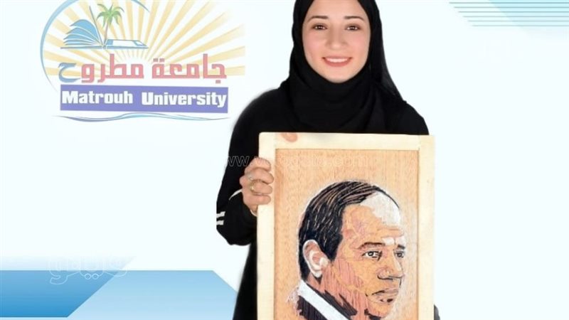 فتاة ترسم صورة الرئيس