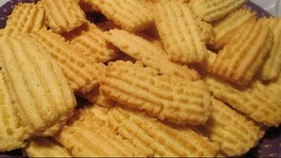 بالنشادر والبرتقال.. طريقة عمل البسكويت بالمقادير