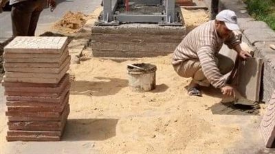 إعادة تأهيل للطرق ورفع كفاءة الإنارة بحي العجوزة | صور