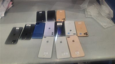 إحباط محاولة تهريب 91 عملة أثرية و13 هاتف آيفون بمطار برج العرب