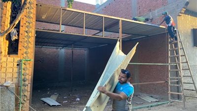 إزالة جمالون مخالف بشارع عثمان محرم في العمرانية |فيديو