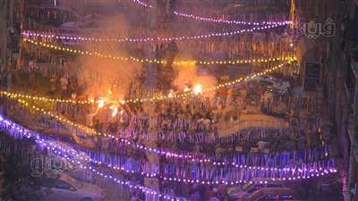 شماريخ وألعاب نارية.. أهالي فيصل ينظمون أكبر مائدة إفطار| فيديو